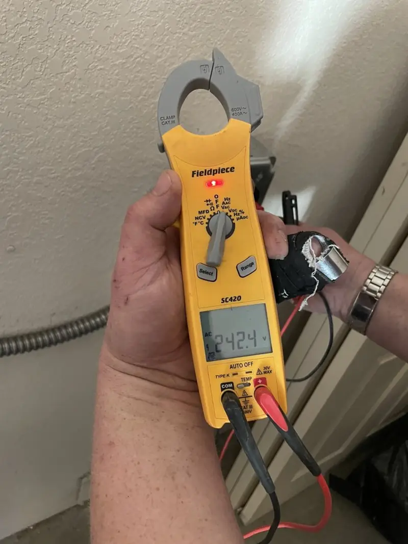 Voltage testing with clamp meter during Generator Installation in Raton